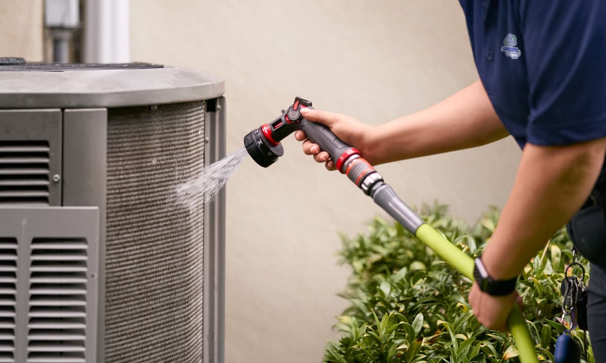SANSONE tech cleaning AC coils.